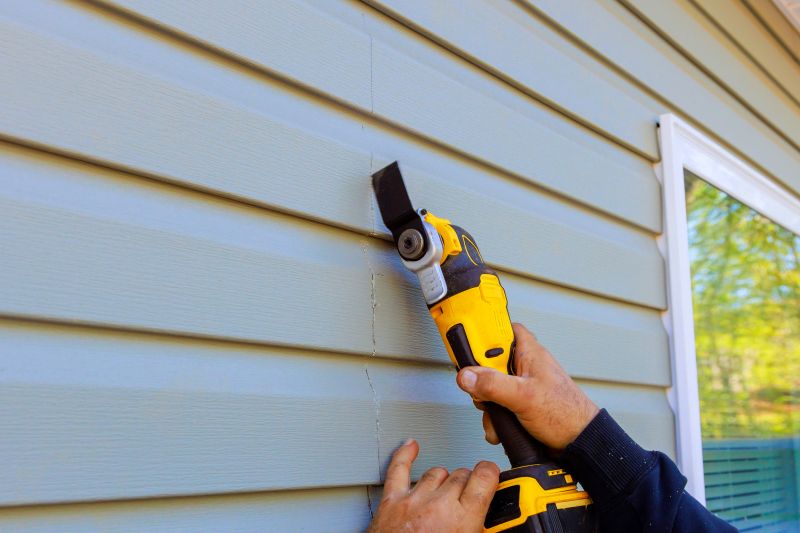 Expert Performing Vinyl Siding Repair
