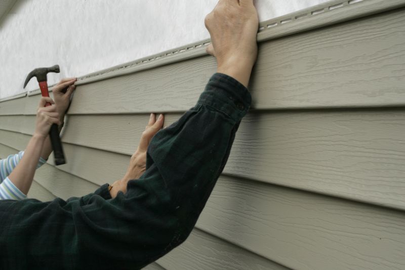 New Vinyl Siding Panel Installation